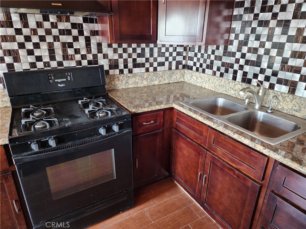 21657 Vista Road Cedarpines Park, CA 92322 - Photo 17 of 39 a close up of a stove top oven sitting inside of a kitchen