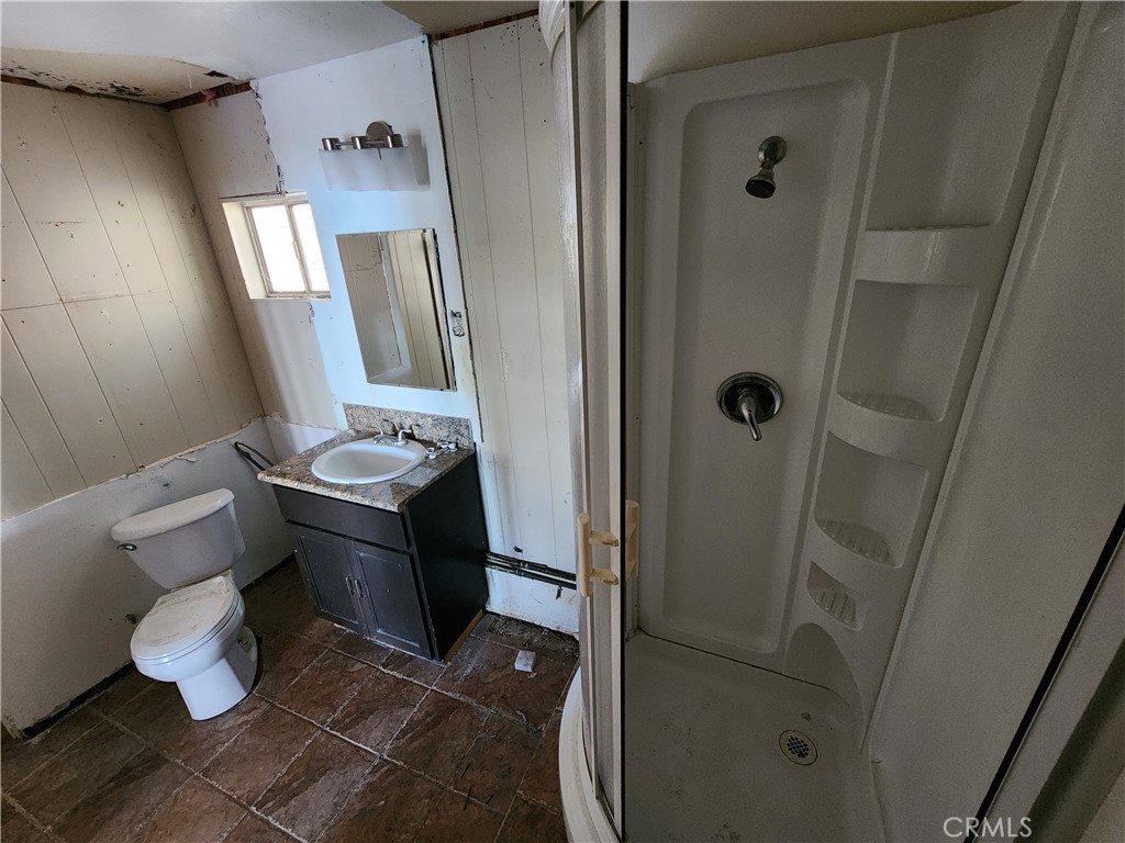 21657 Vista Road Cedarpines Park, CA 92322 - Photo 21 of 39 a bathroom with a sink toilet and shower