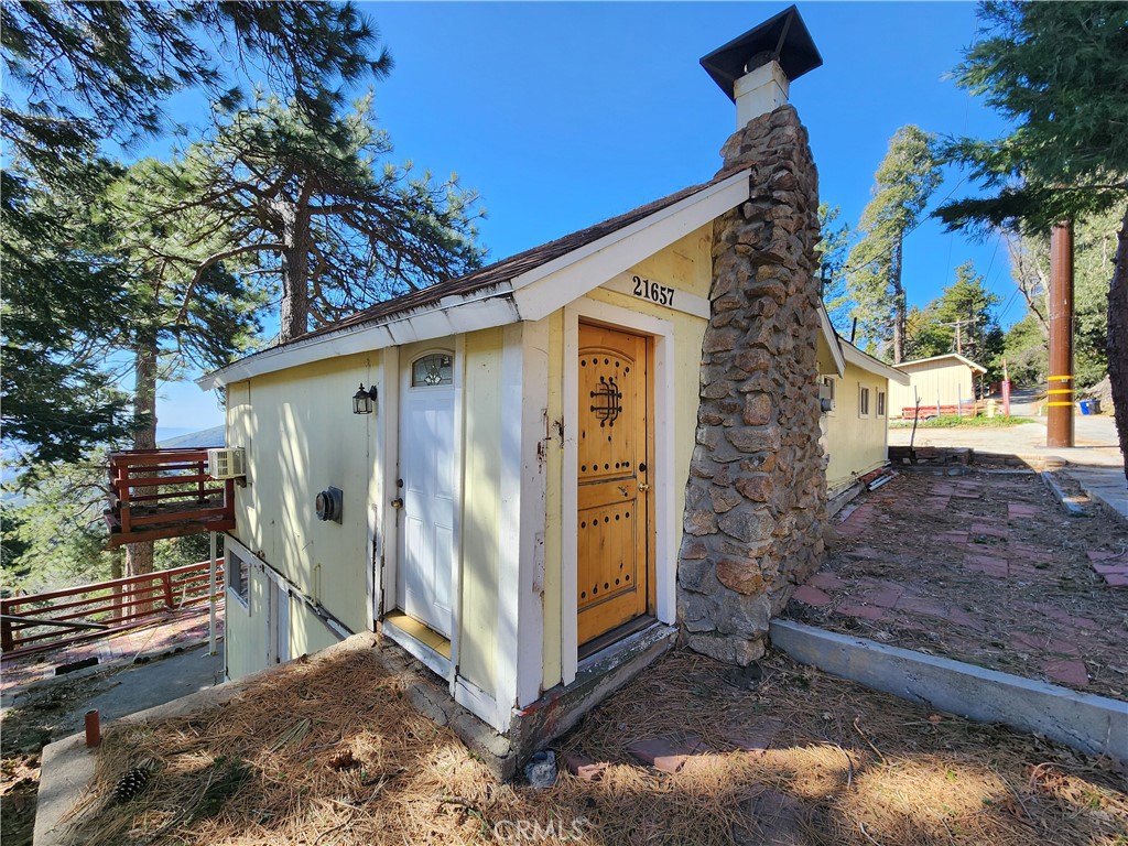 21657 Vista Road Cedarpines Park, CA 92322 - Photo 25 of 39 a view of a house with a yard