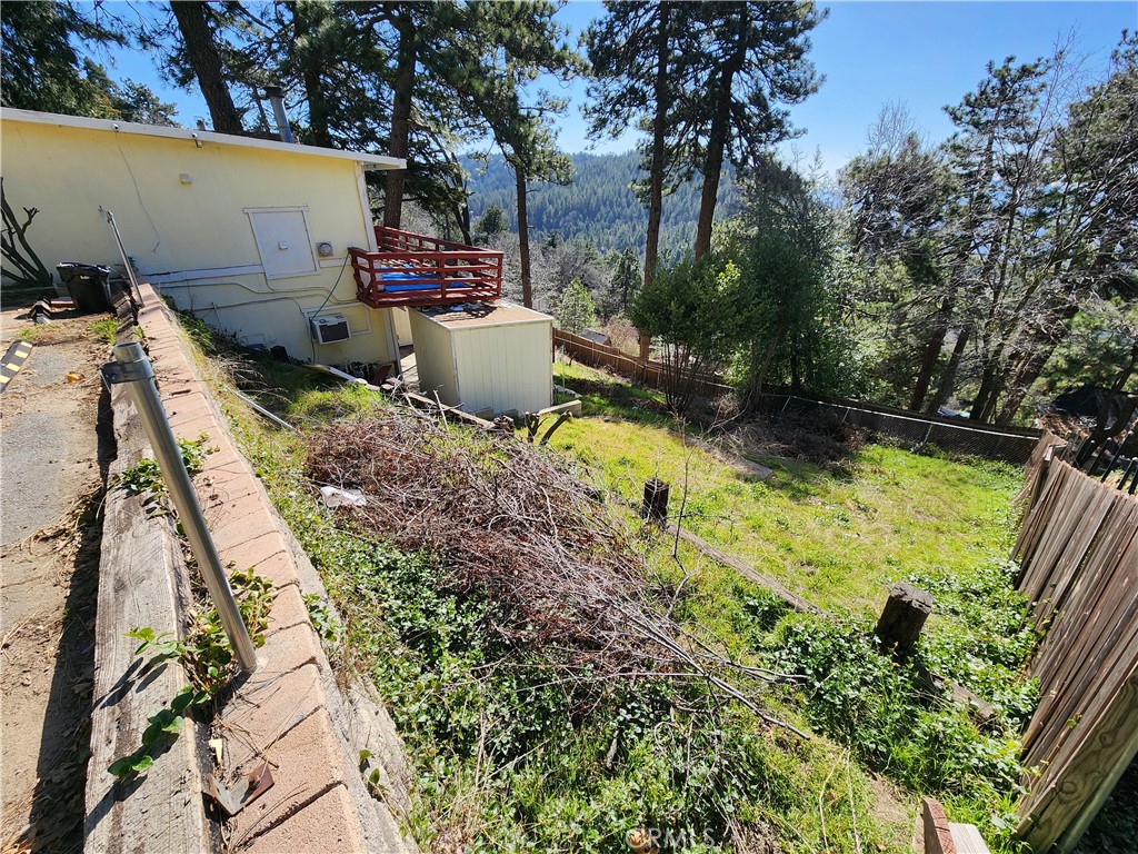 21657 Vista Road Cedarpines Park, CA 92322 - Photo 28 of 39 a view of a backyard with sitting area