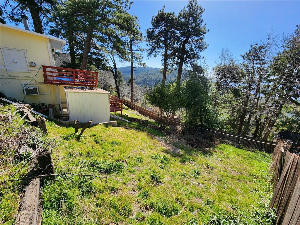 21657 Vista Road Cedarpines Park, CA 92322 - Photo 31 of 39 a view of a backyard with plants and a patio