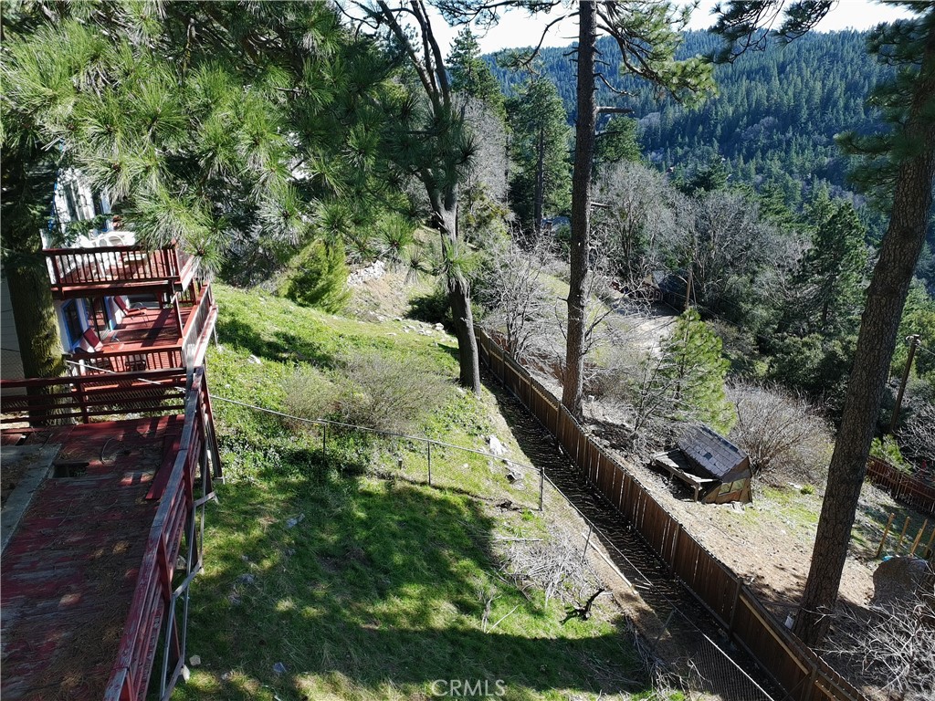 21657 Vista Road Cedarpines Park, CA 92322 - Photo 37 of 39 a view of a garden with an outdoor seating