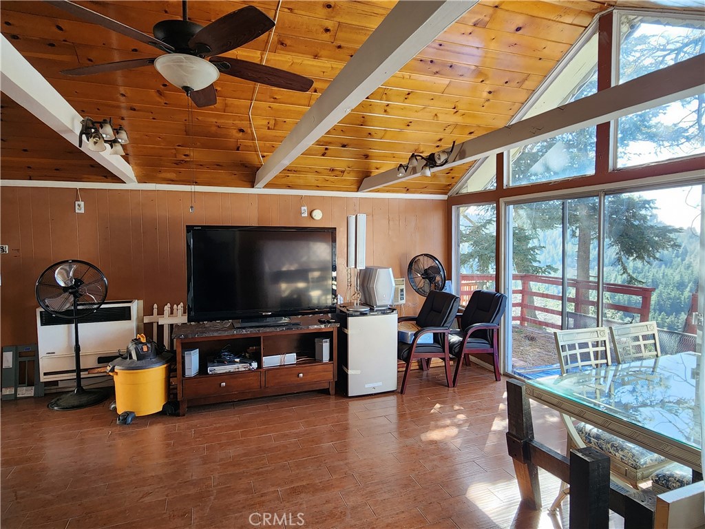 21657 Vista Road Cedarpines Park, CA 92322 - Photo 7 of 39 a living room with furniture and a flat screen tv