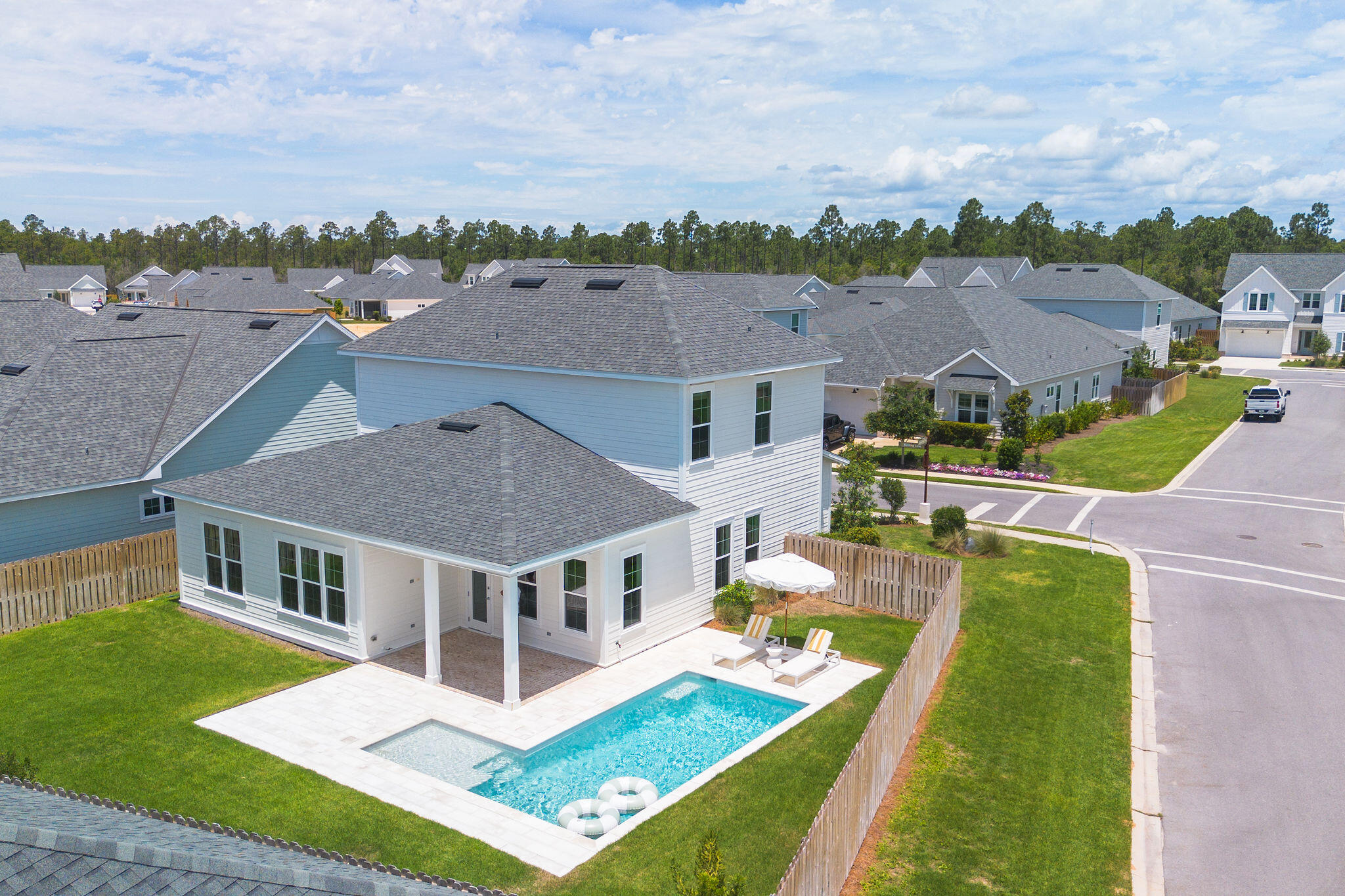 11 Bunting Ln Inlet Beach Inlet Beach, FL 32461 - Photo 7 of 70 an aerial view of multiple houses with a big yard