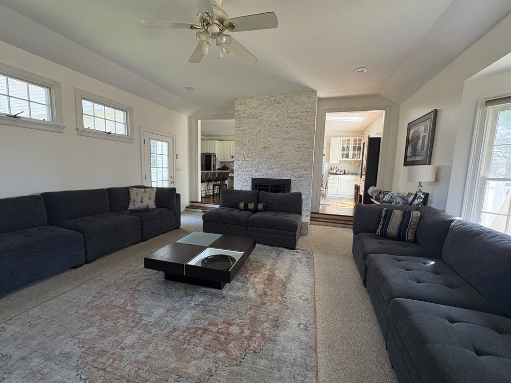 23 Indian Rock Road Natick, MA 01760 - Photo 3 of 22 a living room with furniture and a large window