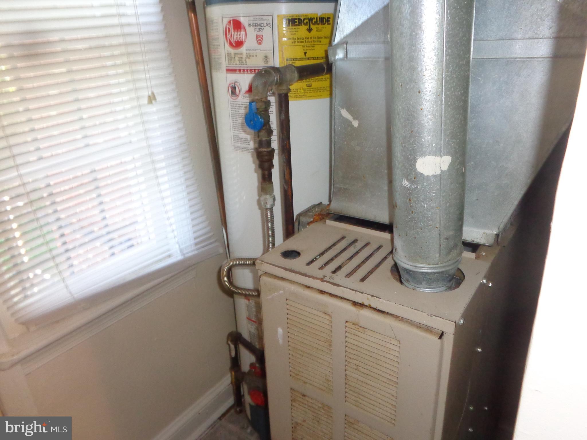 5024 Astor Place Southeast Washington, DC 20019 - Photo 18 of 19 Vacant unit heat furnace and hot water heater