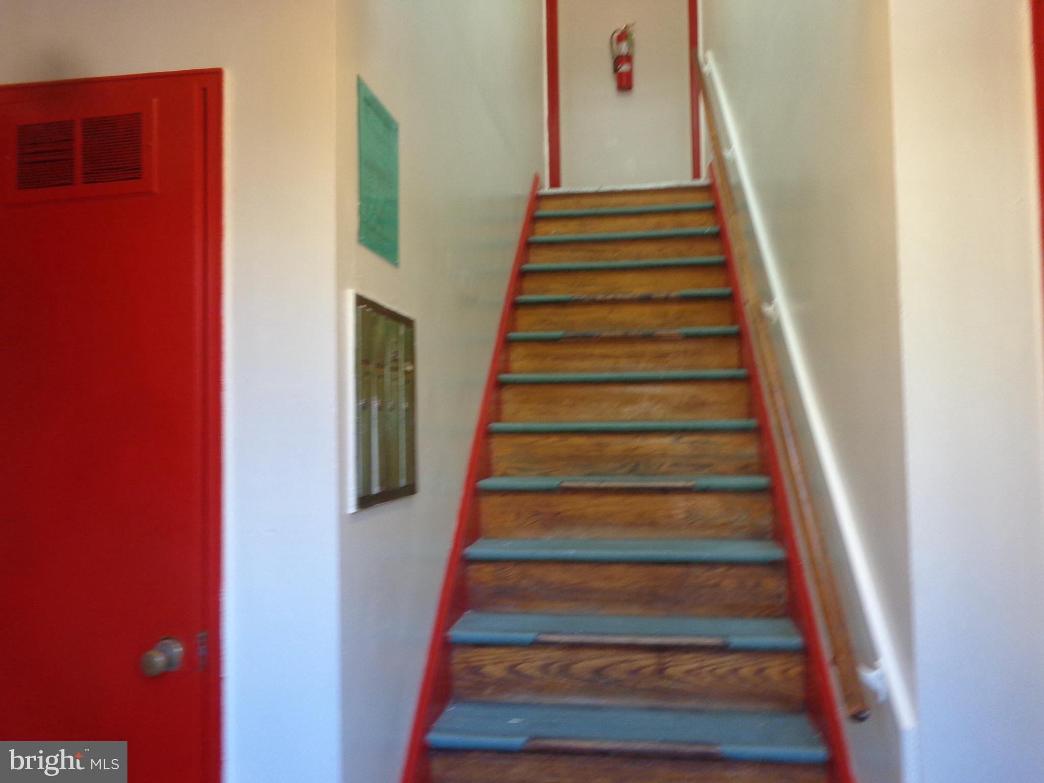 5024 Astor Place Southeast Washington, DC 20019 - Photo 3 of 19 Stairway in foyer to second floor