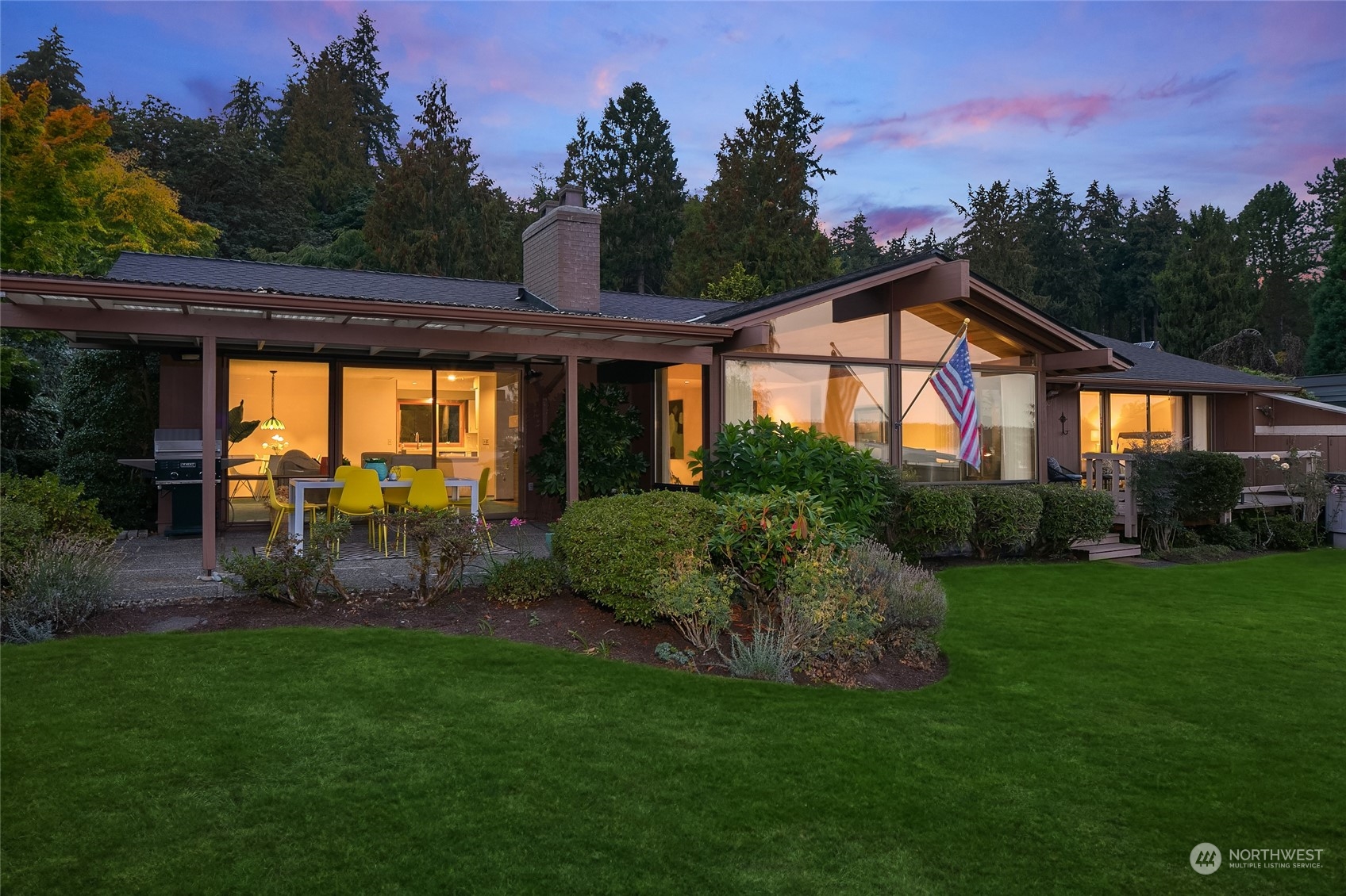5300 Butterworth Road Mercer Island, WA 98040 - Photo 33 of 36 a front view of a house with a yard and porch