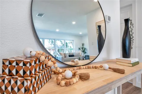 a very nice looking room with a mirror