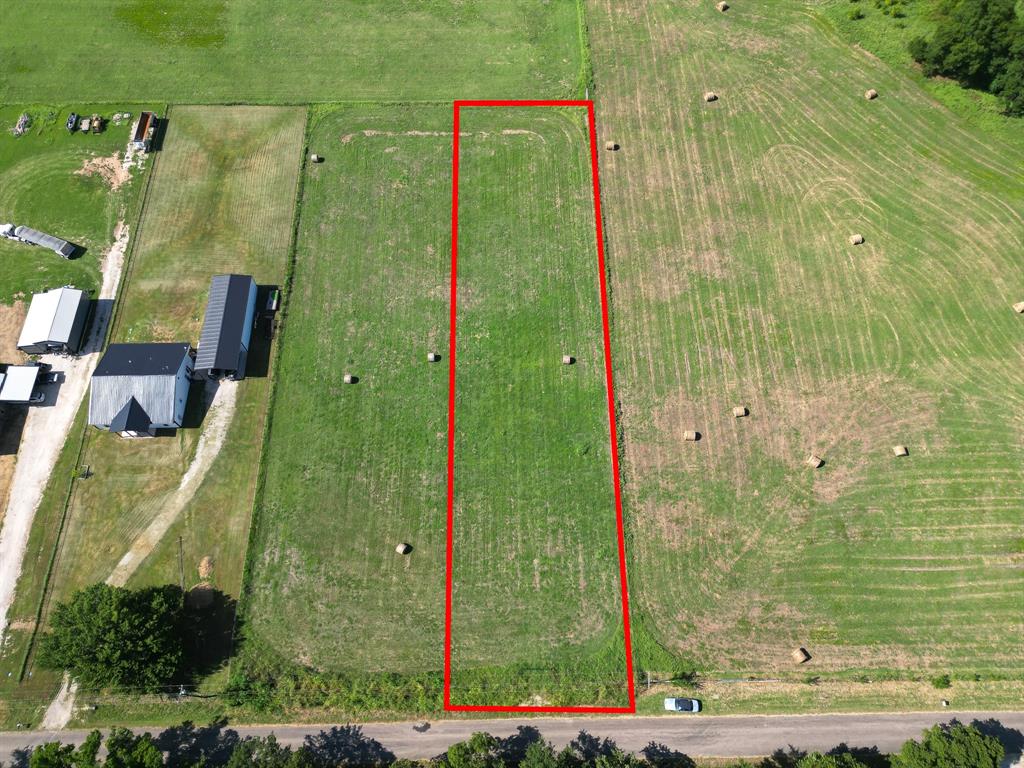 a view of a bathroom with a shower and a sink