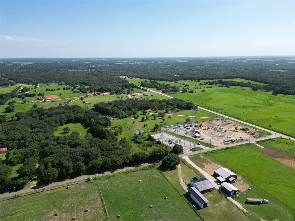 7 Arkansas Road Sadler, TX 76264 - Photo 3 of 8 an aerial view of a golf course with parking space