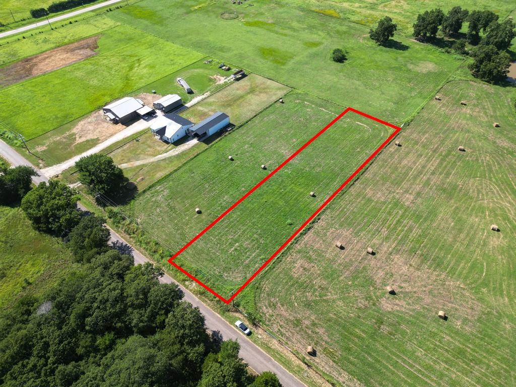 7 Arkansas Road Sadler, TX 76264 - Photo 6 of 8 an aerial view of a pool