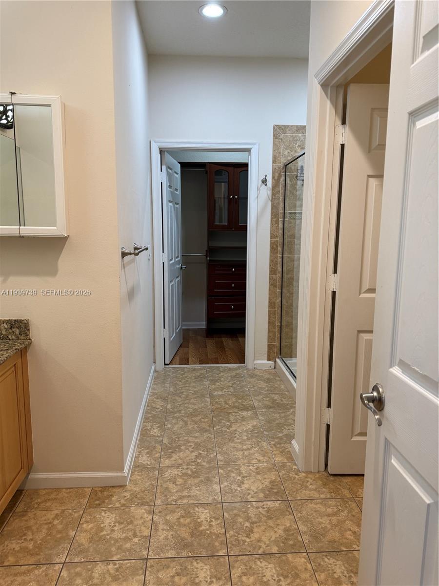 120 Cat Rock Lane Jupiter, FL 33458 - Photo 17 of 28 a view of room with window and a bathroom