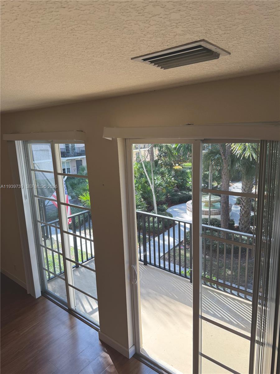 120 Cat Rock Lane Jupiter, FL 33458 - Photo 28 of 28 a view of a glass door and porch