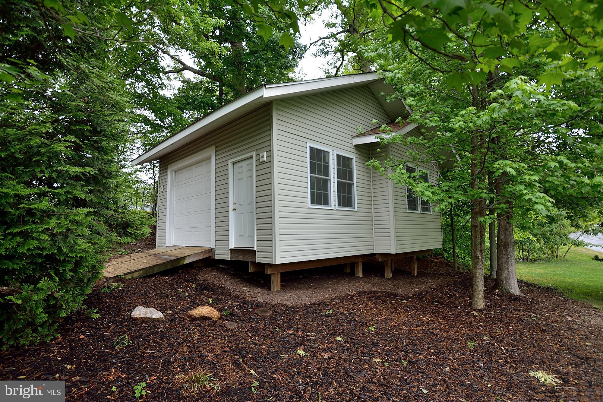 8834 Rommel Drive Lorton, VA 22079 - Photo 29 of 30 24 ft x 22 ft 'Shed' ...with Lawn Tractor!