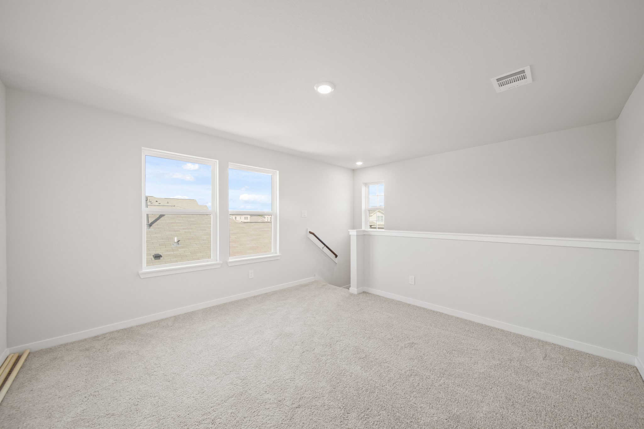 305 Bennett Street Angleton, TX 77515 - Photo 15 of 27 a view of an empty room with a window