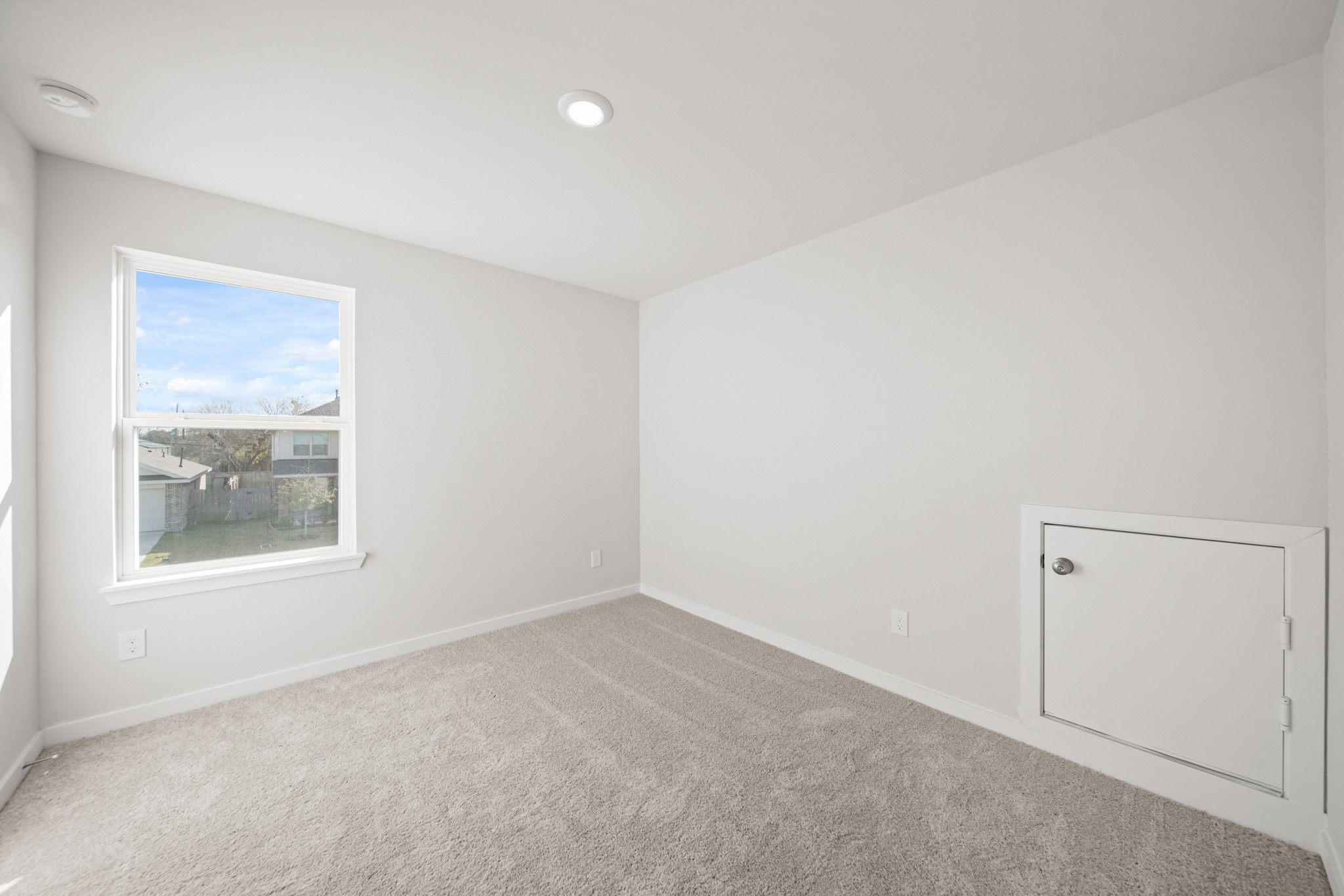 305 Bennett Street Angleton, TX 77515 - Photo 18 of 27 an empty room with a window