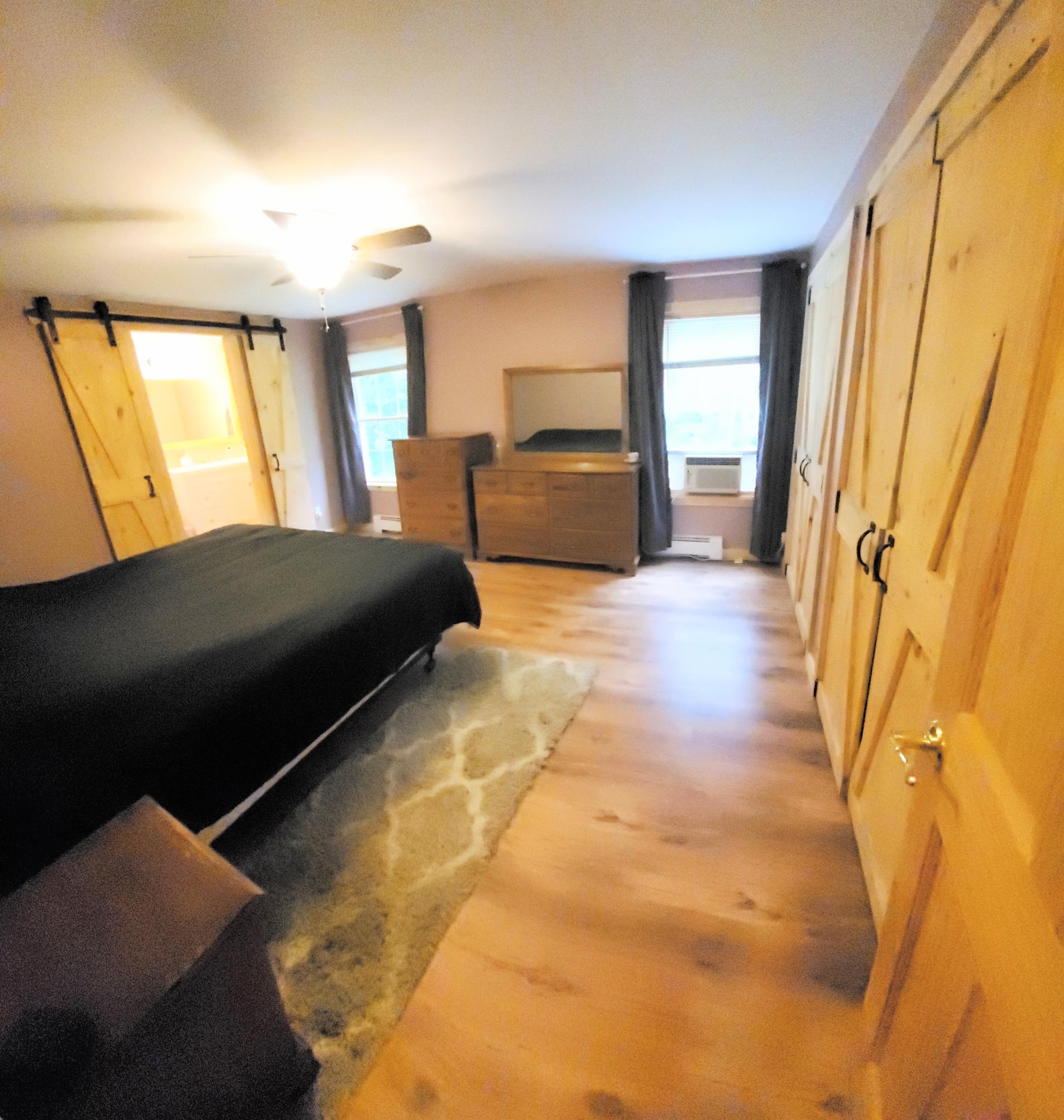 75 Mt Tom Road Smithfield, ME 04978 - Photo 17 of 30 17 Primary bedroom with bath