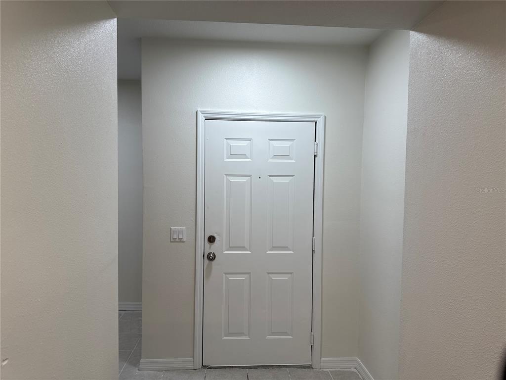 9515 Grovedale Circle, Unit 101 Riverview, FL 33578 - Photo 3 of 22 a view of front door