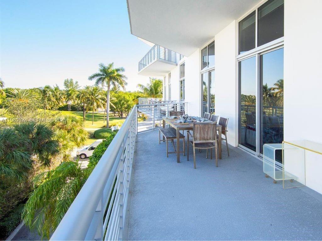 2001 Meridian Avenue, Unit 414 Miami Beach, FL 33139 - Photo 3 of 22 a dining room with furniture and garden view