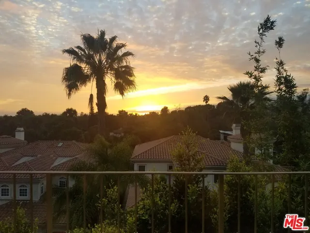 a view of a city and a mountain