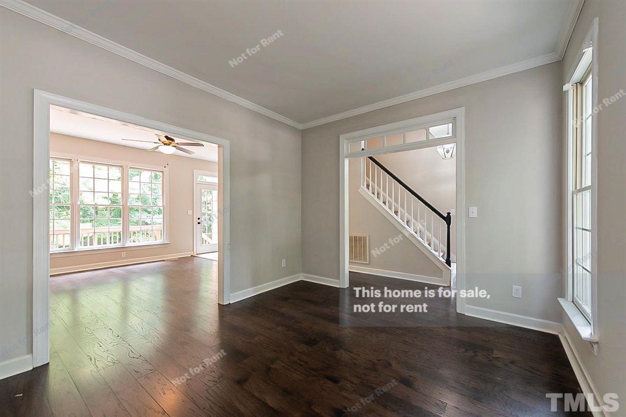 8528 Yucca Trail Raleigh, NC 27615 - Photo 12 of 21 a view of an entryway with wooden floor