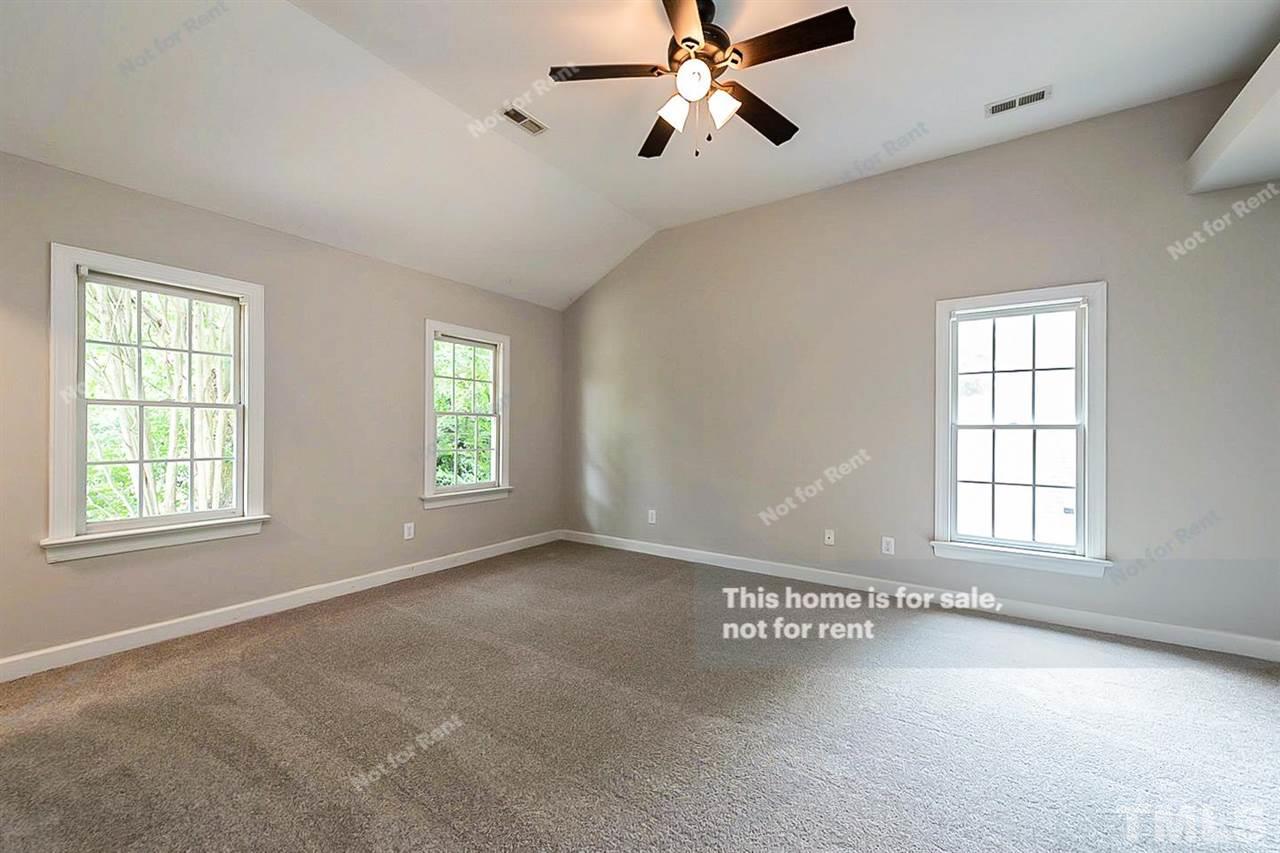 8528 Yucca Trail Raleigh, NC 27615 - Photo 14 of 21 a view of an empty room with a window
