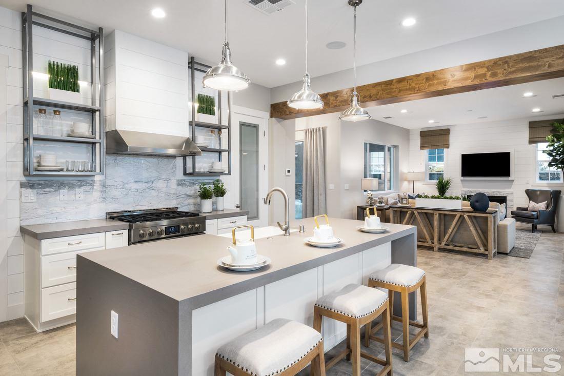 2207 Willow Ridge Road, Unit HOMESITE 3 Reno, NV 89521 - Photo 4 of 24 a large kitchen with a table and chairs