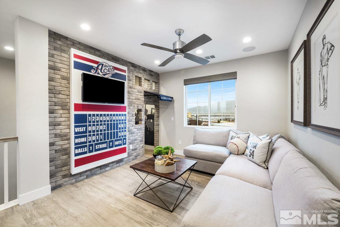 2207 Willow Ridge Road, Unit HOMESITE 3 Reno, NV 89521 - Photo 8 of 24 a living room with furniture and a flat screen tv