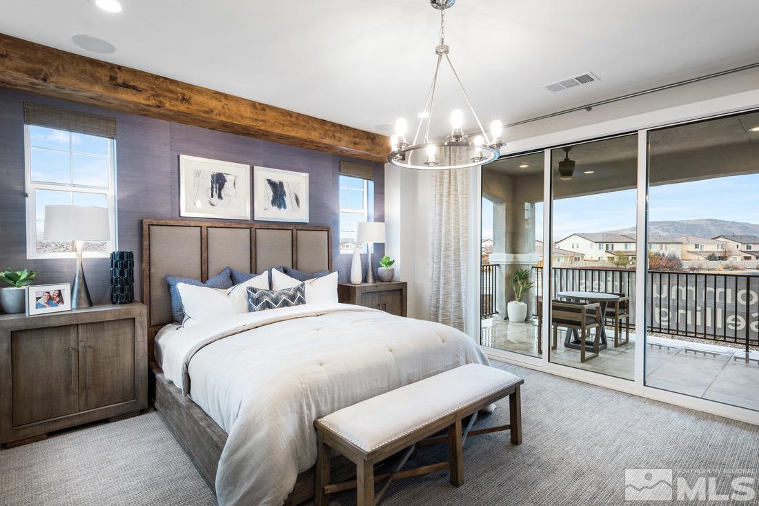 2207 Willow Ridge Road, Unit HOMESITE 3 Reno, NV 89521 - Photo 9 of 24 a bedroom with a bed and a chandelier