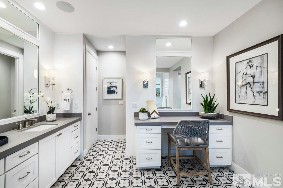 2207 Willow Ridge Road, Unit HOMESITE 3 Reno, NV 89521 - Photo 10 of 24 a spacious bathroom with a double vanity sink a large mirror a shower and a bathtub