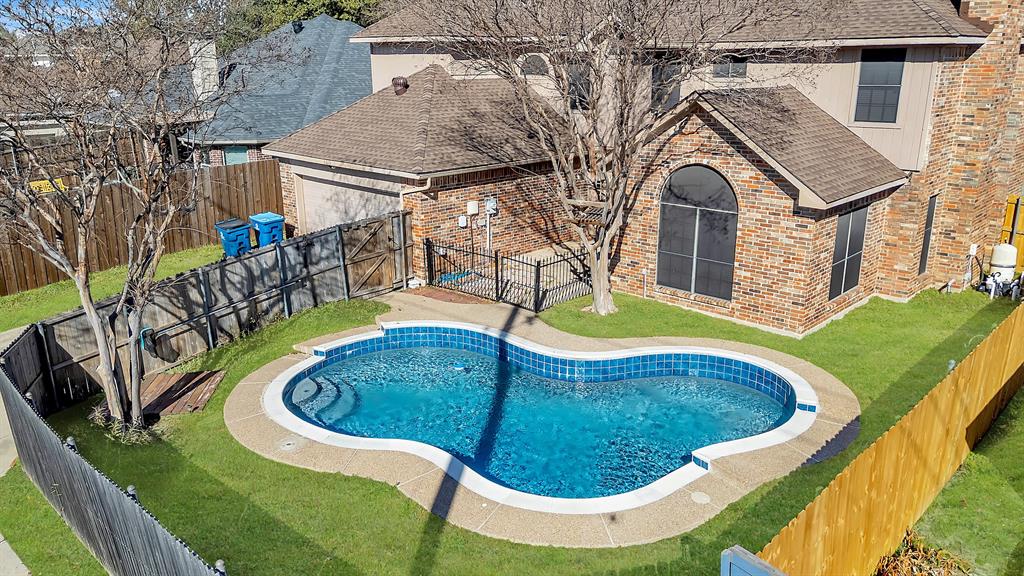 6613 Springmeadow Lane Rowlett, TX 75089 - Photo 20 of 20 an aerial view of a house with swimming pool