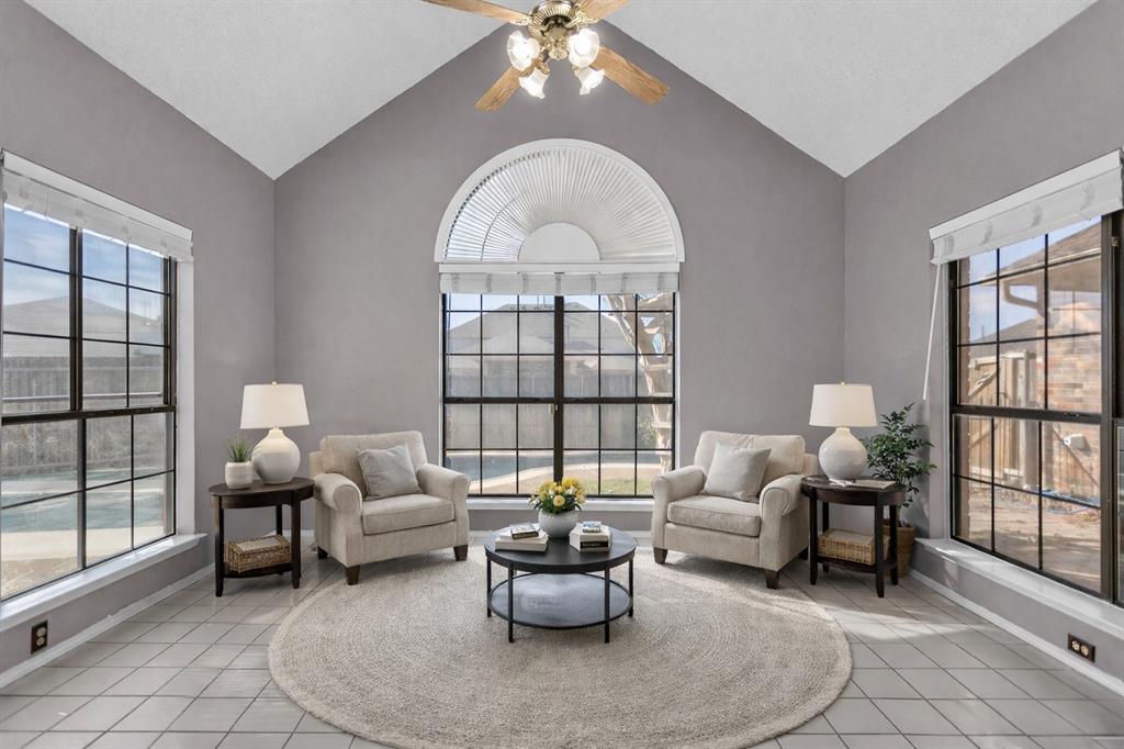 6613 Springmeadow Lane Rowlett, TX 75089 - Photo 4 of 20 a living room with furniture and a large window