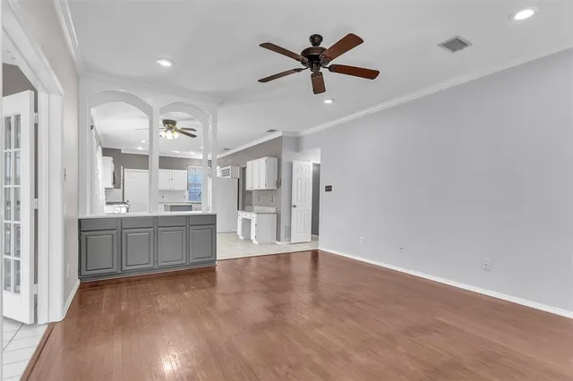 a view of a kitchen with a sink and cabinet area