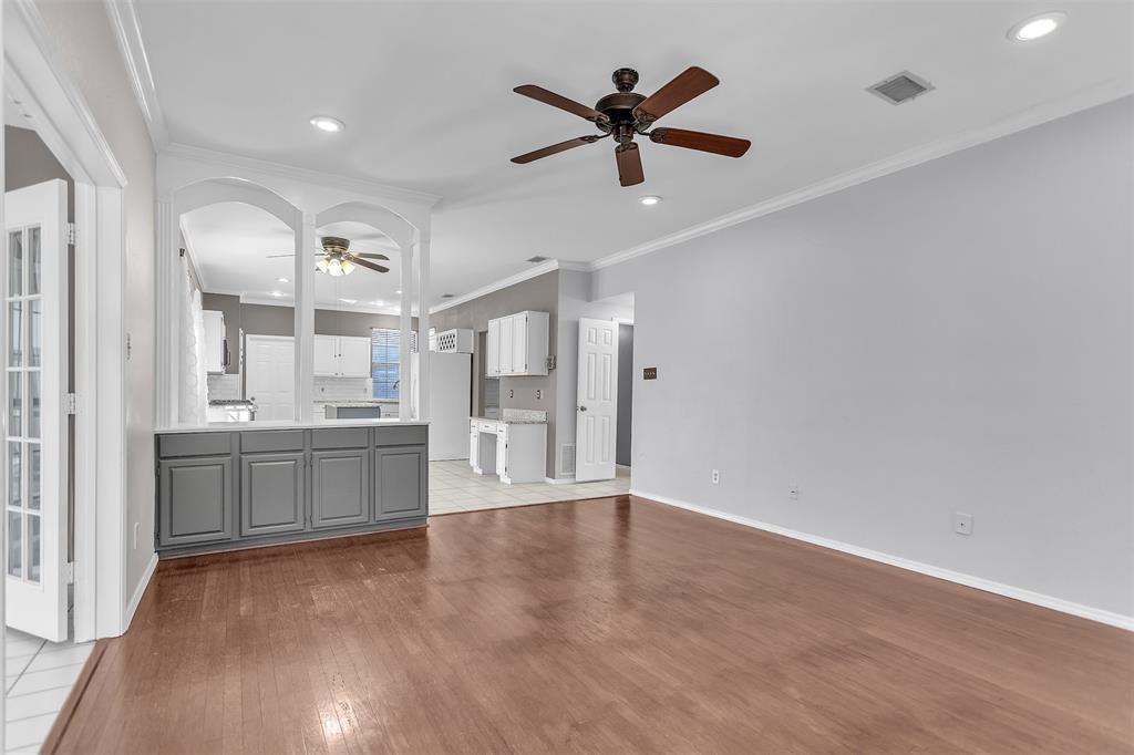 6613 Springmeadow Lane Rowlett, TX 75089 - Photo 9 of 20 a view of a kitchen with a sink and cabinet area