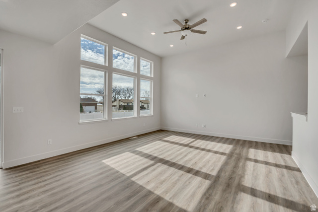 3839 West 825 North, Unit WF18 West Point, UT 84015 - Photo 11 of 22 Unfurnished room featuring recessed lighting, ceiling fan, and light wood-type flooring