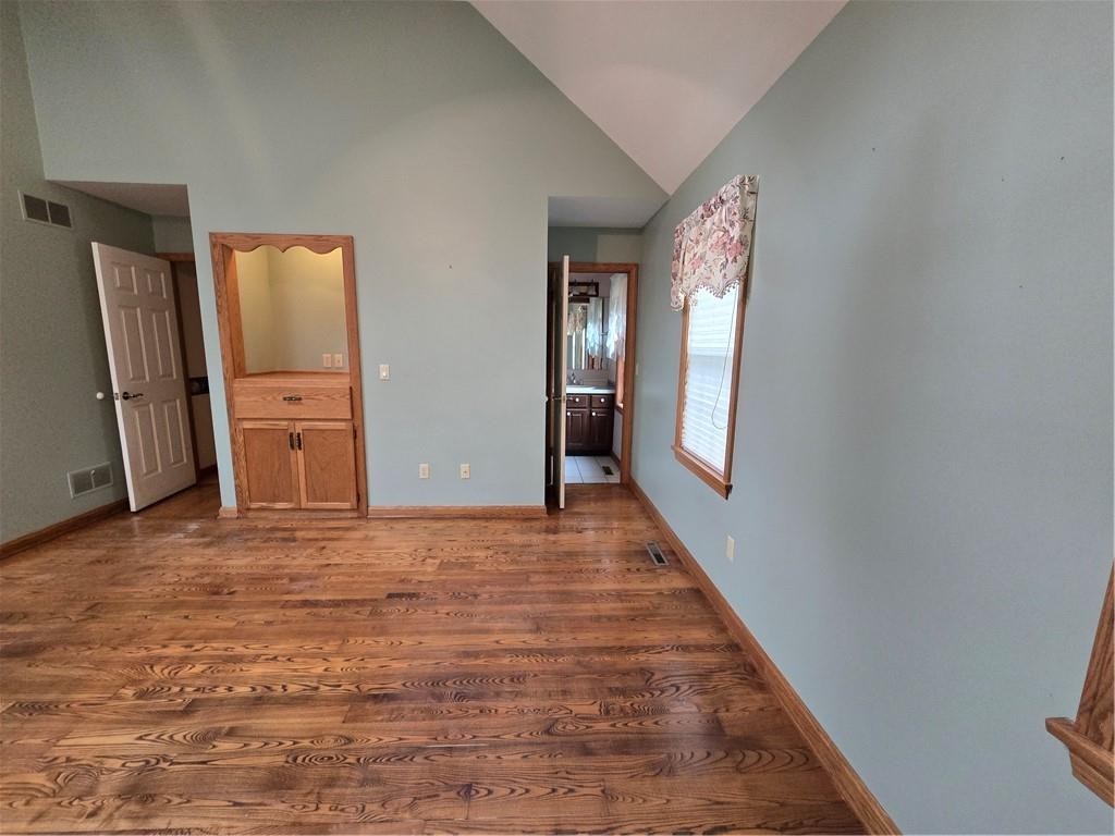 205 Hamburg Road Greenville, PA 16125 - Photo 10 of 39 a view of an empty room with window and wooden floor