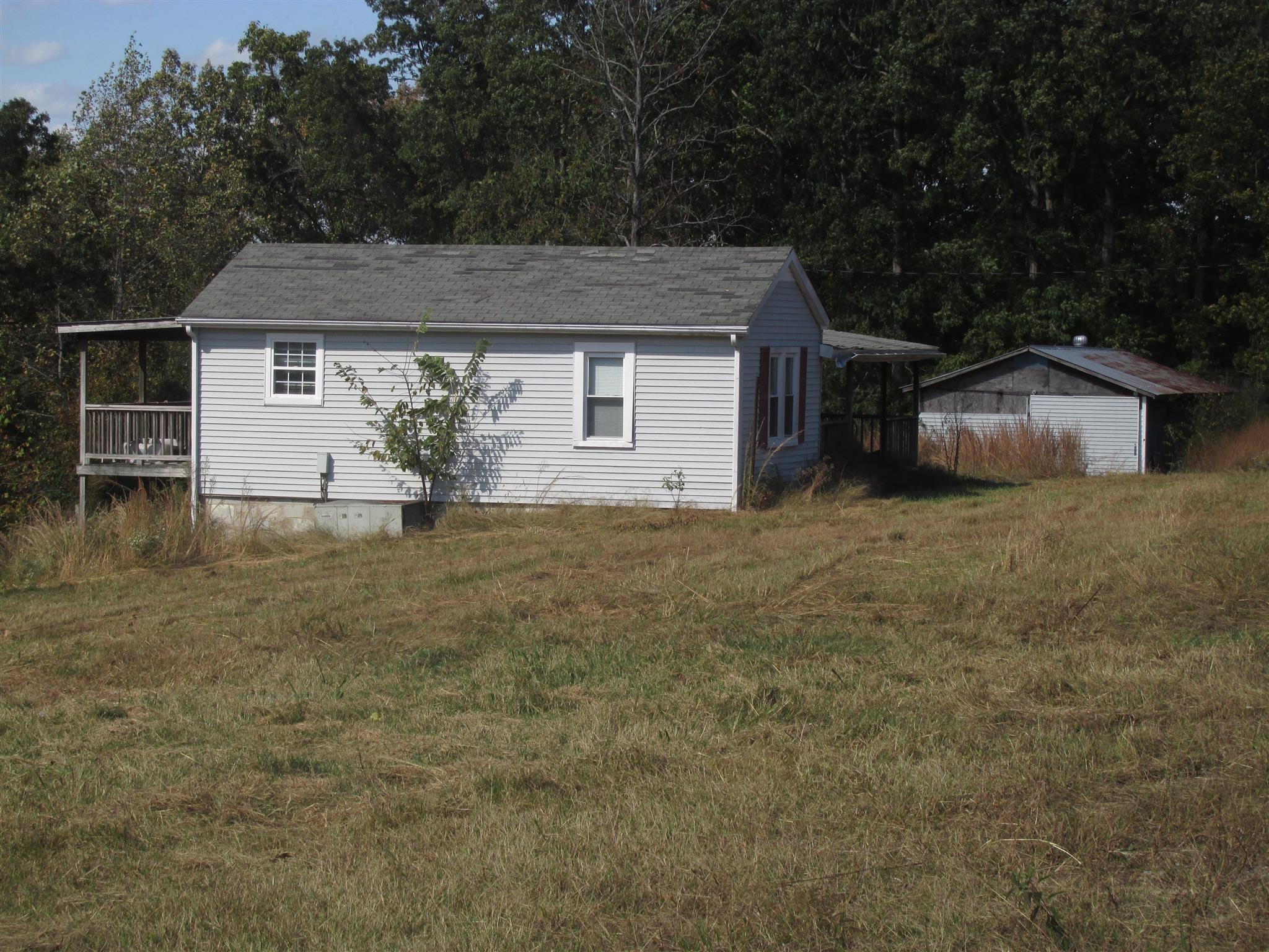 997 Pack Road White Bluff, TN 37187 - Photo 11 of 11 front view of a house with a yard