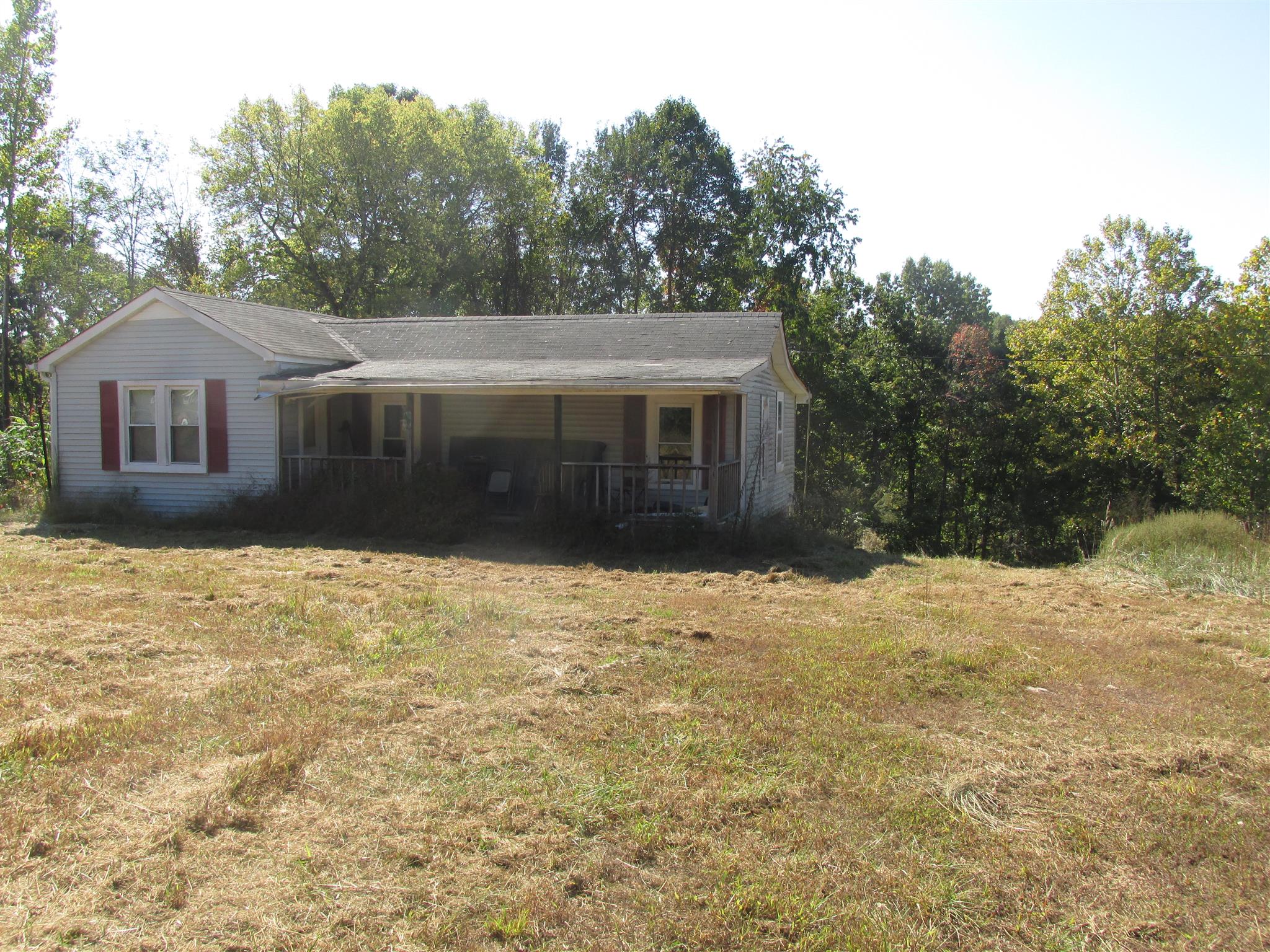 997 Pack Road White Bluff, TN 37187 - Photo 5 of 11 a front view of a house with a yard and trees