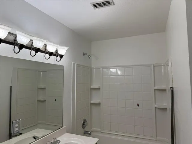 a view of an empty room with window