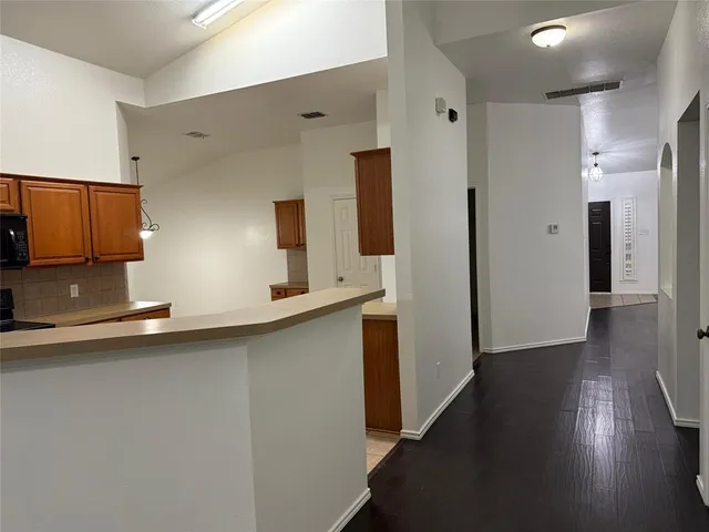 a bathroom with a bathtub and a sink
