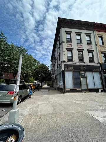 a view of a car park in front of house