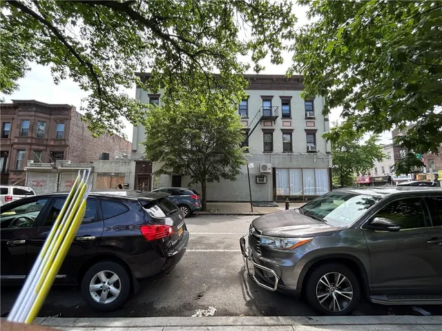 a car parked in front of a house