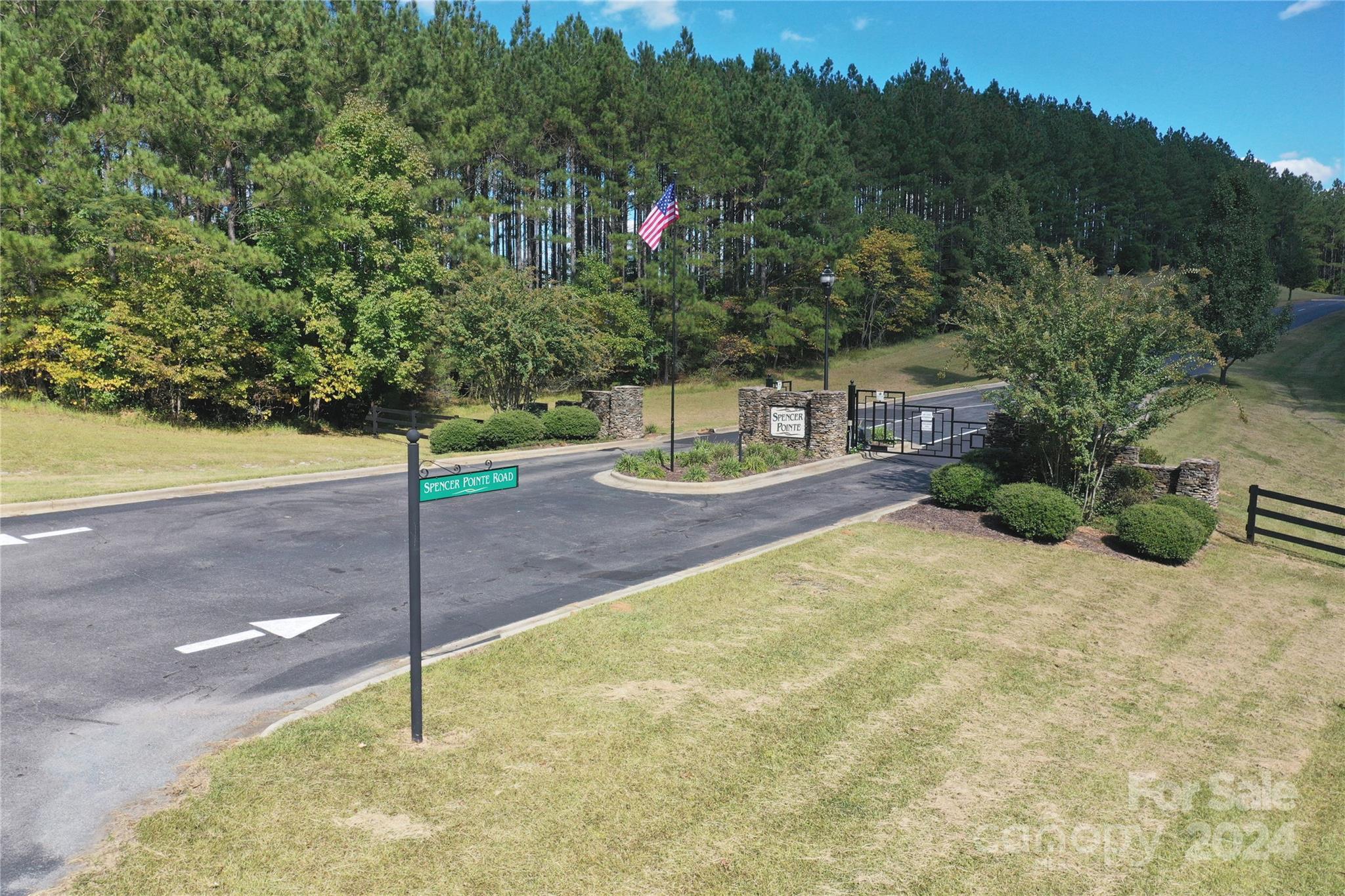 Tbd Tbd Spencer Pointe Road, Unit LOT 21A Lilesville, NC 28091 - Photo 2 of 16 a backyard of a house with table and chairs
