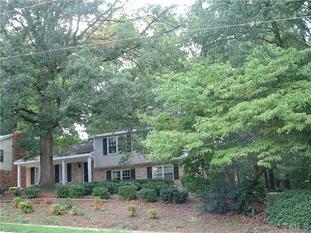 2717 Wycliff Road Raleigh, NC 27607 - Photo 1 of 9 a front view of a house with a tree