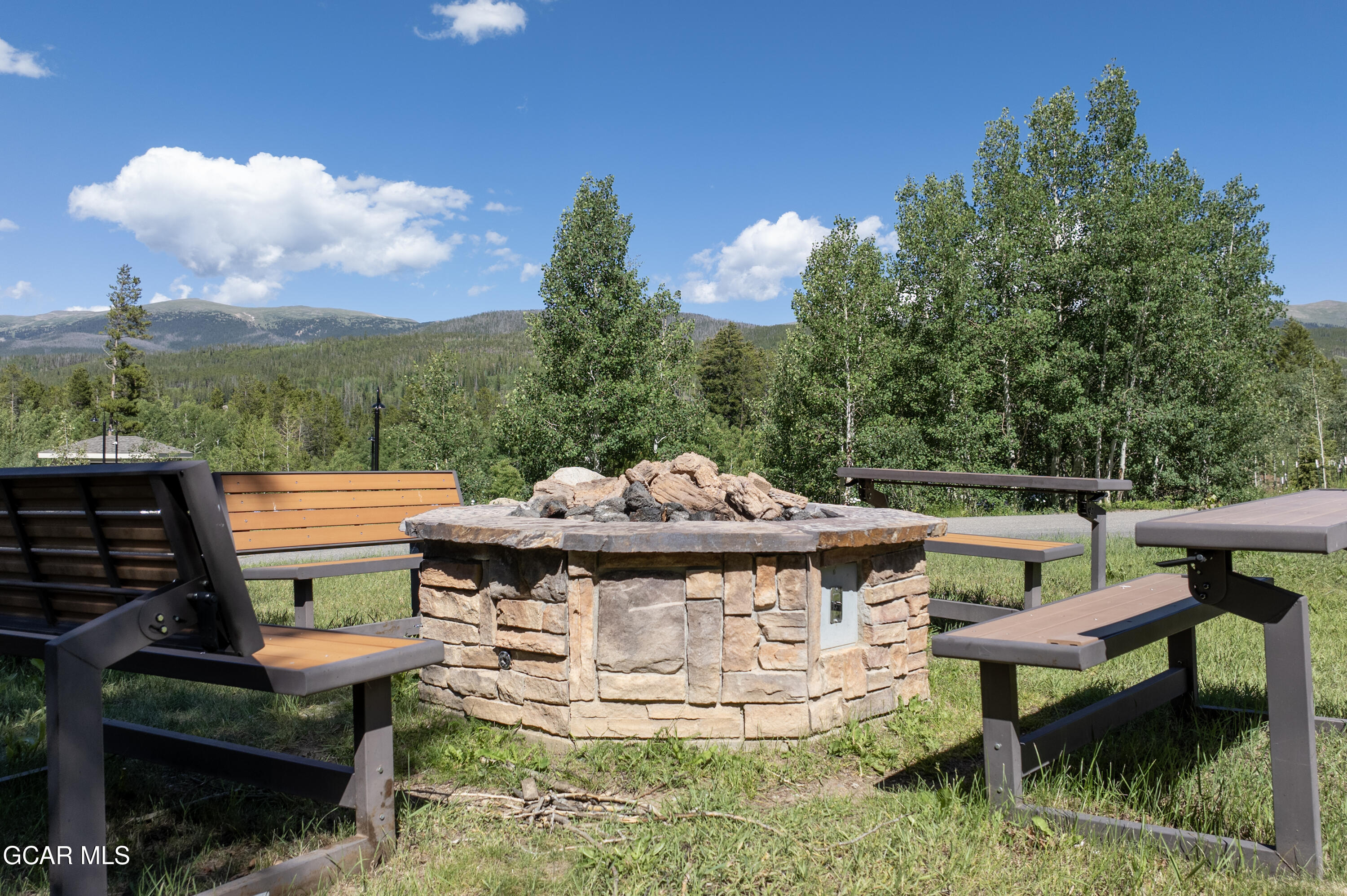 490 Kings Crossing Road, Unit 331 Winter Park, CO 80482 - Photo 34 of 38 a view of a chairs and table in the terrace