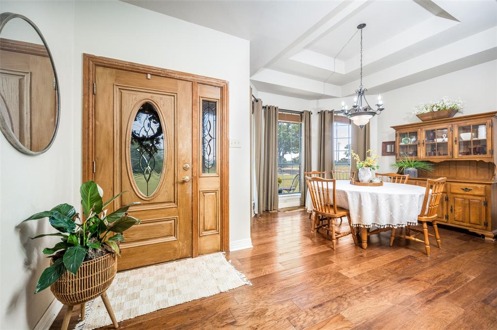 778 County Road 3141 Decatur, TX 76234 - Photo 5 of 25 a view of a dining room with furniture window and wooden floor