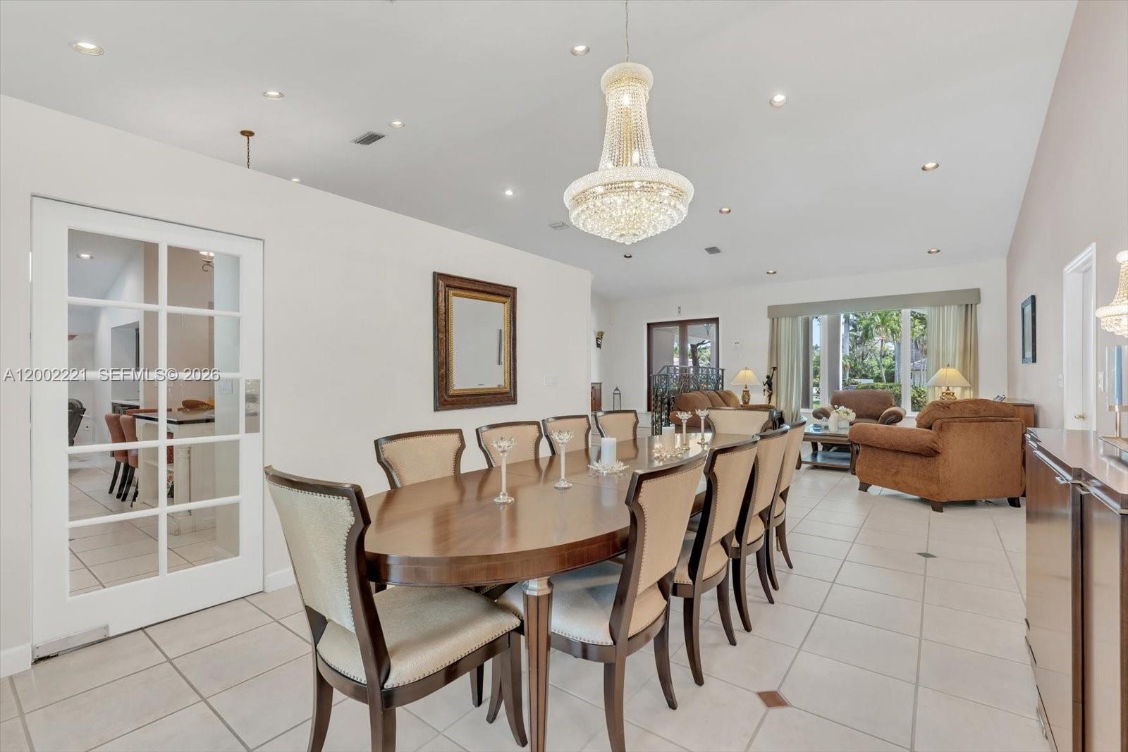 9941 Southwest 143rd Street Miami, FL 33176 - Photo 11 of 48 Dining room with a French door leading into the kitchen