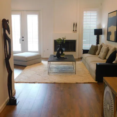 a view of dining area with wooden floor