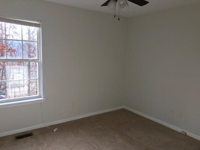 4086 Parks Road Flowery Branch, GA 30542 - Photo 12 of 23 an empty room with a window
